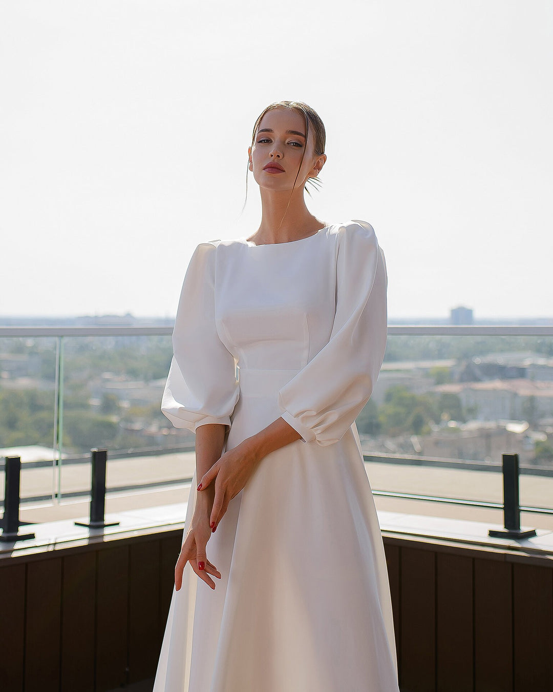 White Midi Dress with Open Back and Voluminous Sleeves