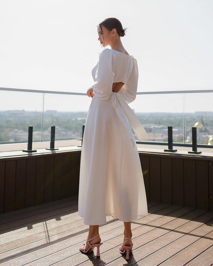 White Midi Dress with Open Back and Voluminous Sleeves