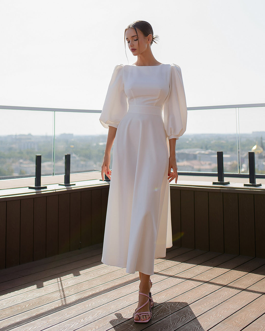 White Midi Dress with Open Back and Voluminous Sleeves